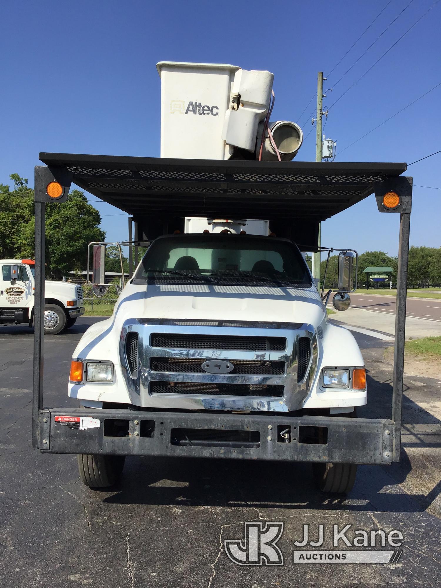 (Ocala, FL) Altec LR756, Over-Center Bucket Truck mounted behind cab on 2013 Ford F750 Chipper Dump