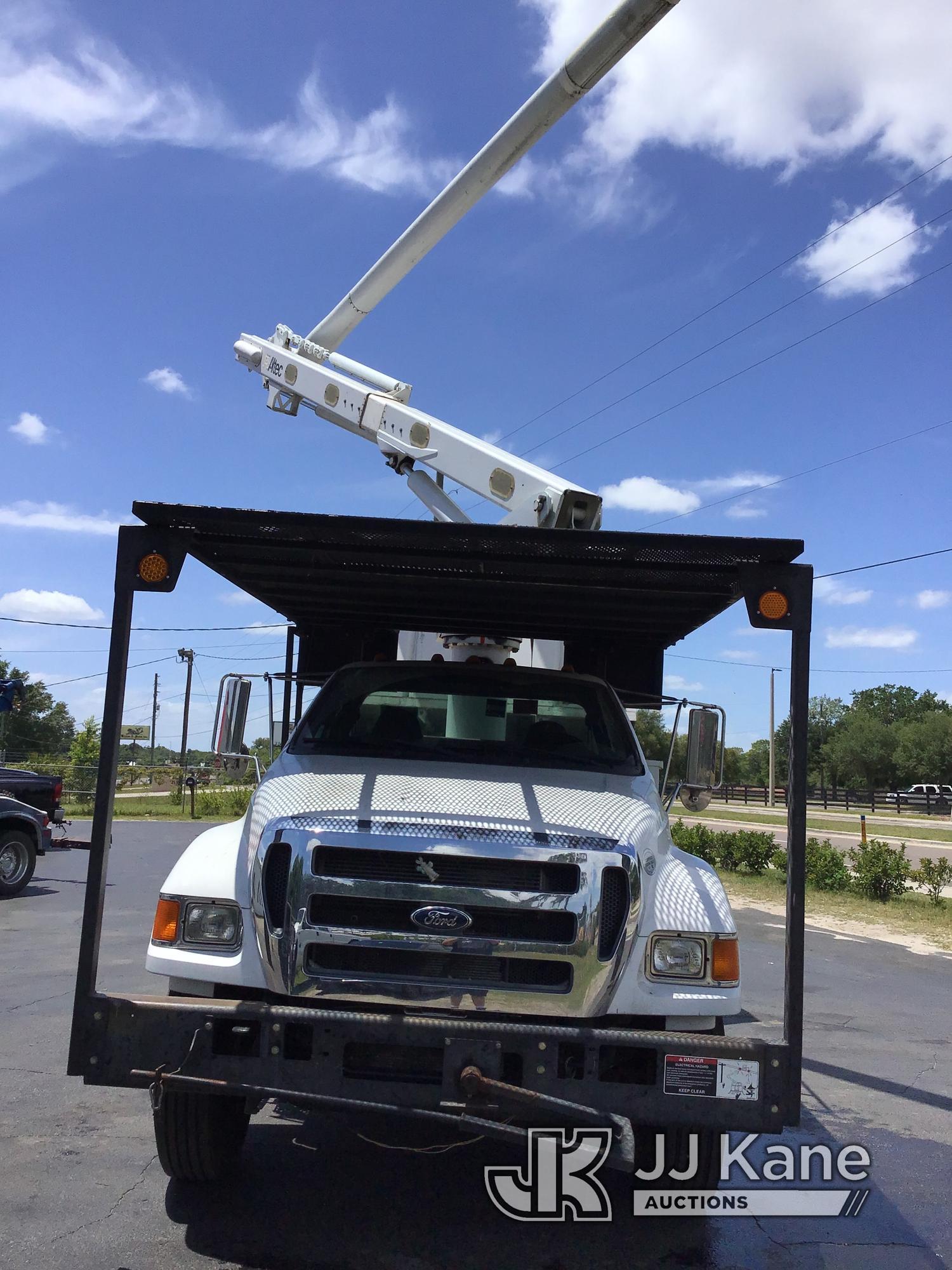 (Ocala, FL) Altec LR756, Over-Center Bucket Truck mounted behind cab on 2013 Ford F750 Chipper Dump