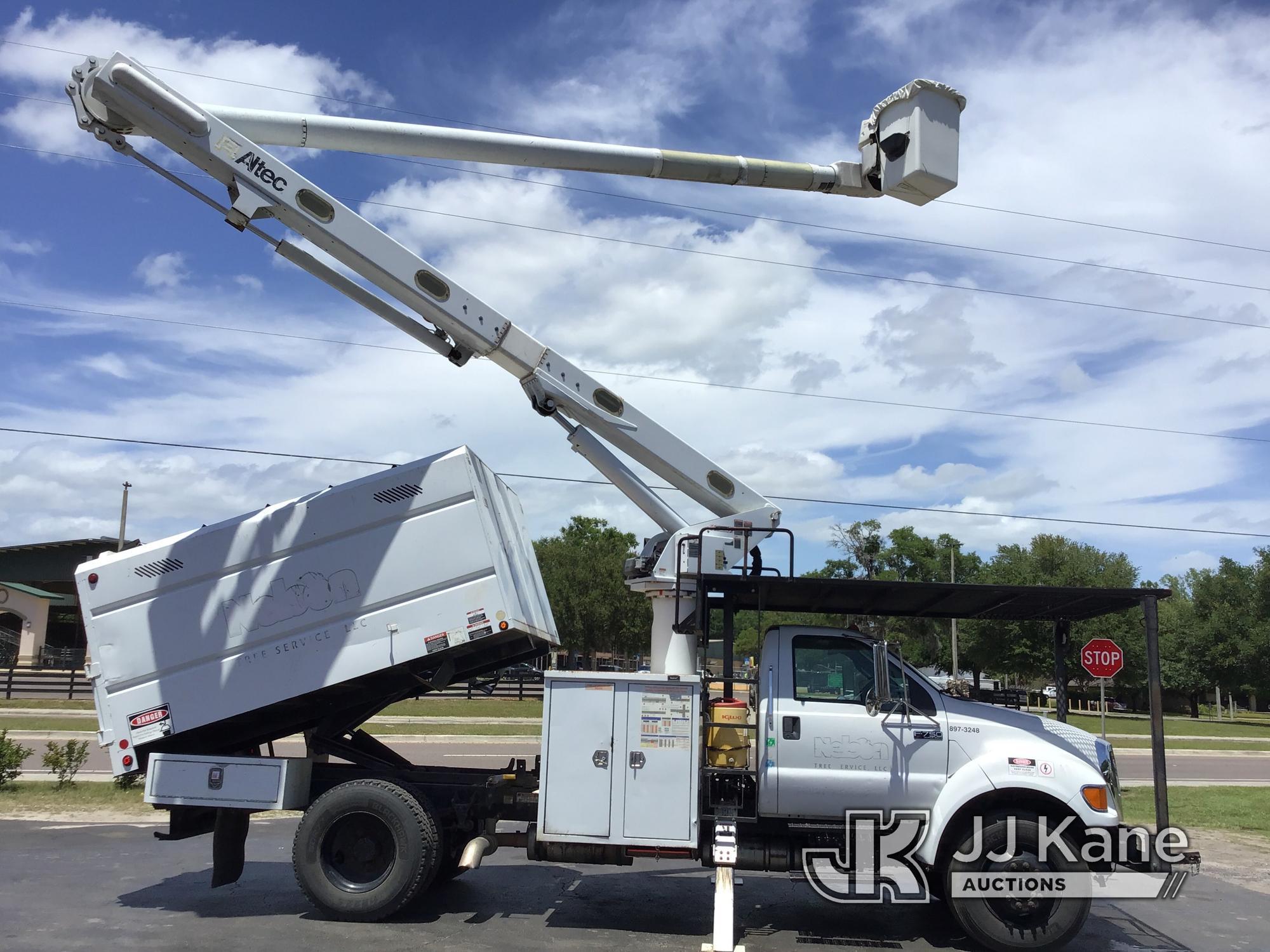 (Ocala, FL) Altec LR756, Over-Center Bucket Truck mounted behind cab on 2013 Ford F750 Chipper Dump