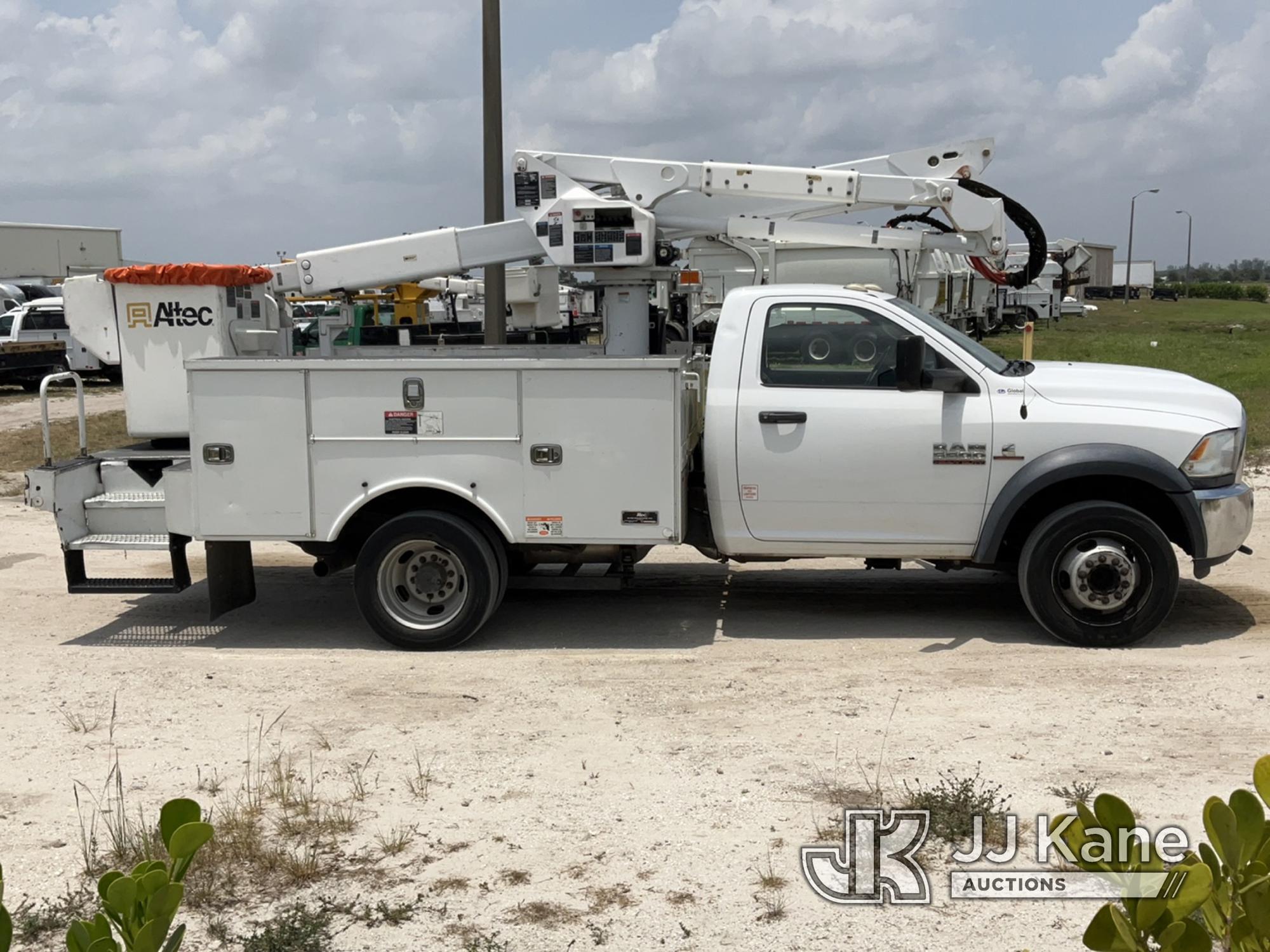 (Westlake, FL) Altec AT40G, Articulating & Telescopic Bucket Truck mounted behind cab on 2015 RAM 55