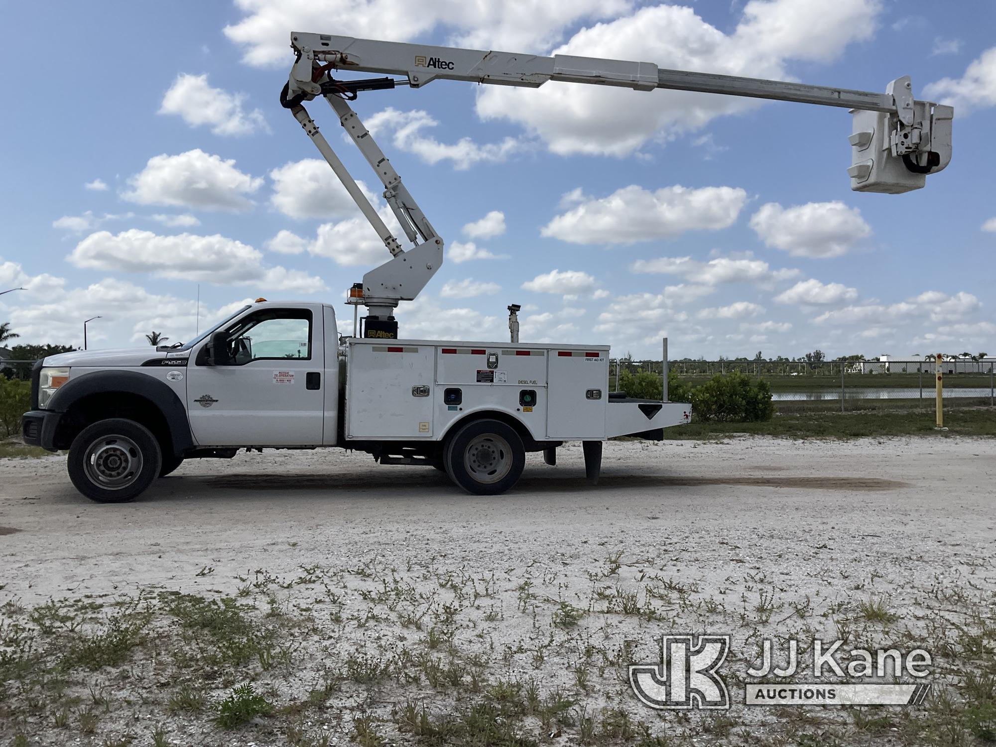 (Westlake, FL) Altec AT37G, Bucket Truck mounted behind cab on 2015 Ford F550 4x4 Flatbed/Utility Tr