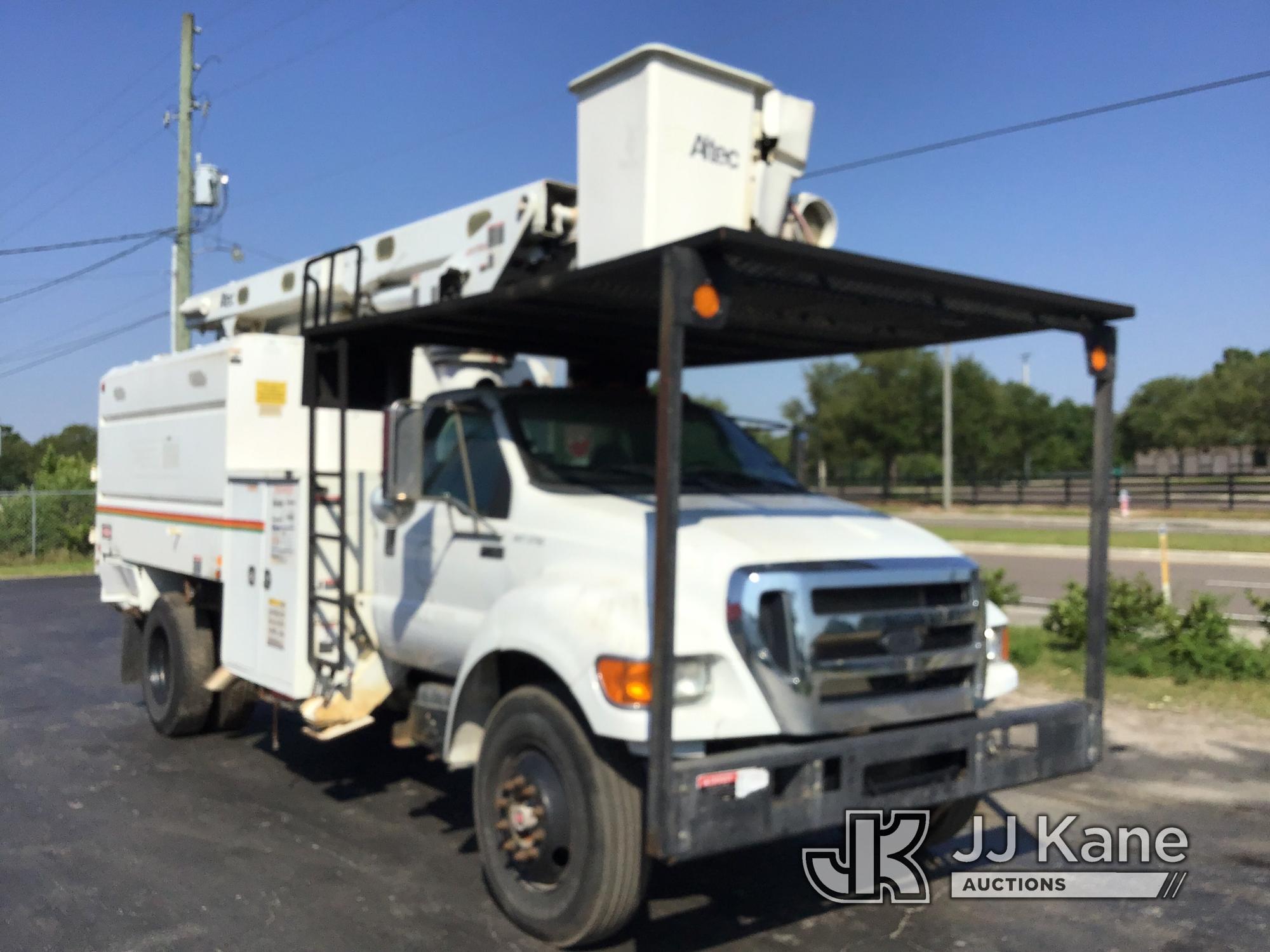 (Ocala, FL) Altec LR756, Over-Center Bucket Truck mounted behind cab on 2013 Ford F750 Chipper Dump