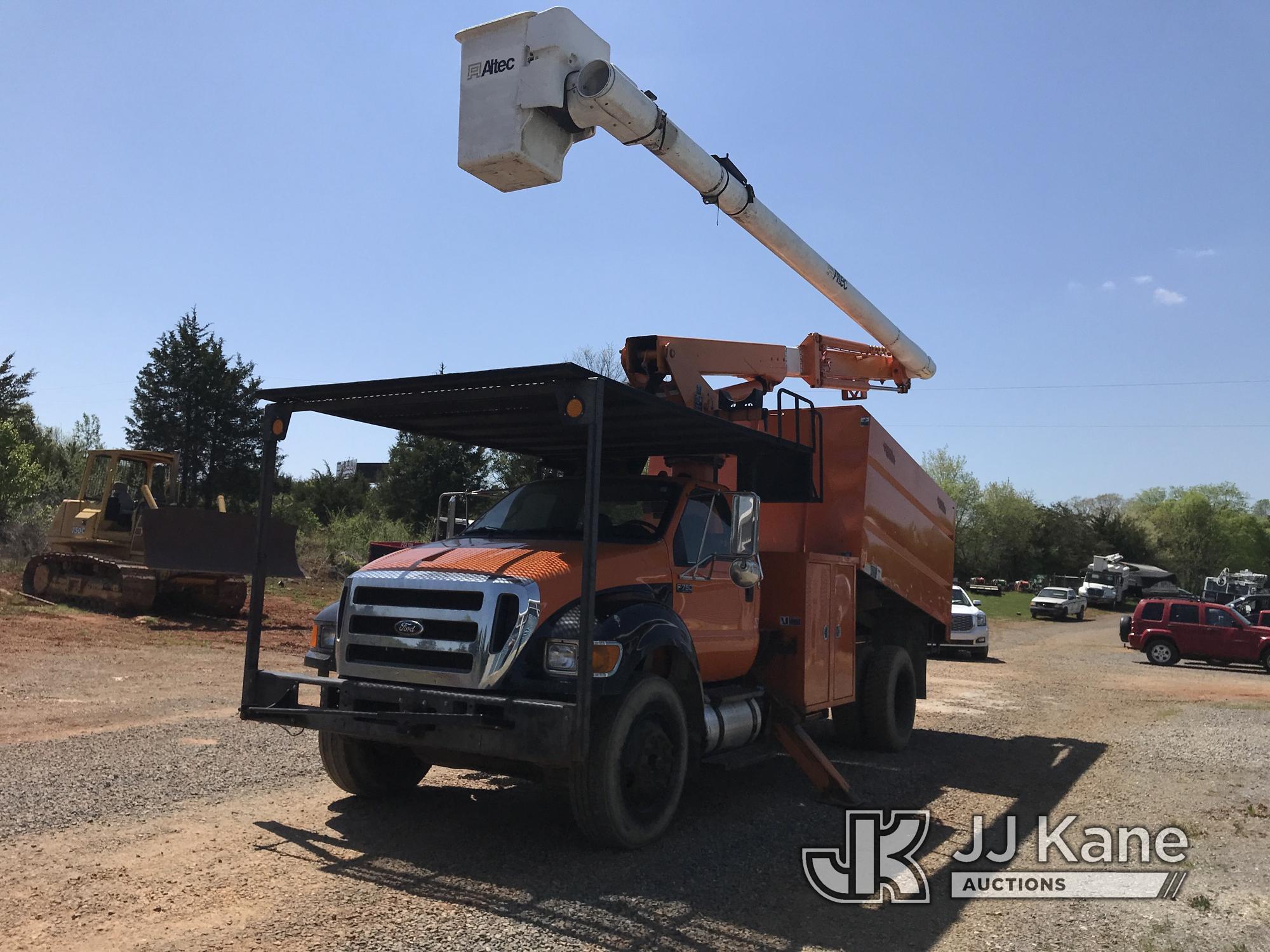 (Kodak, TN) Altec LR756, Over-Center Bucket Truck mounted behind cab on 2013 Ford F750 Chipper Dump