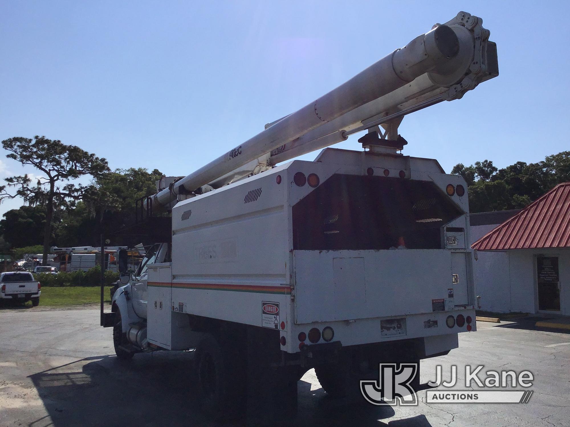 (Ocala, FL) Altec LR756, Over-Center Bucket Truck mounted behind cab on 2013 Ford F750 Chipper Dump