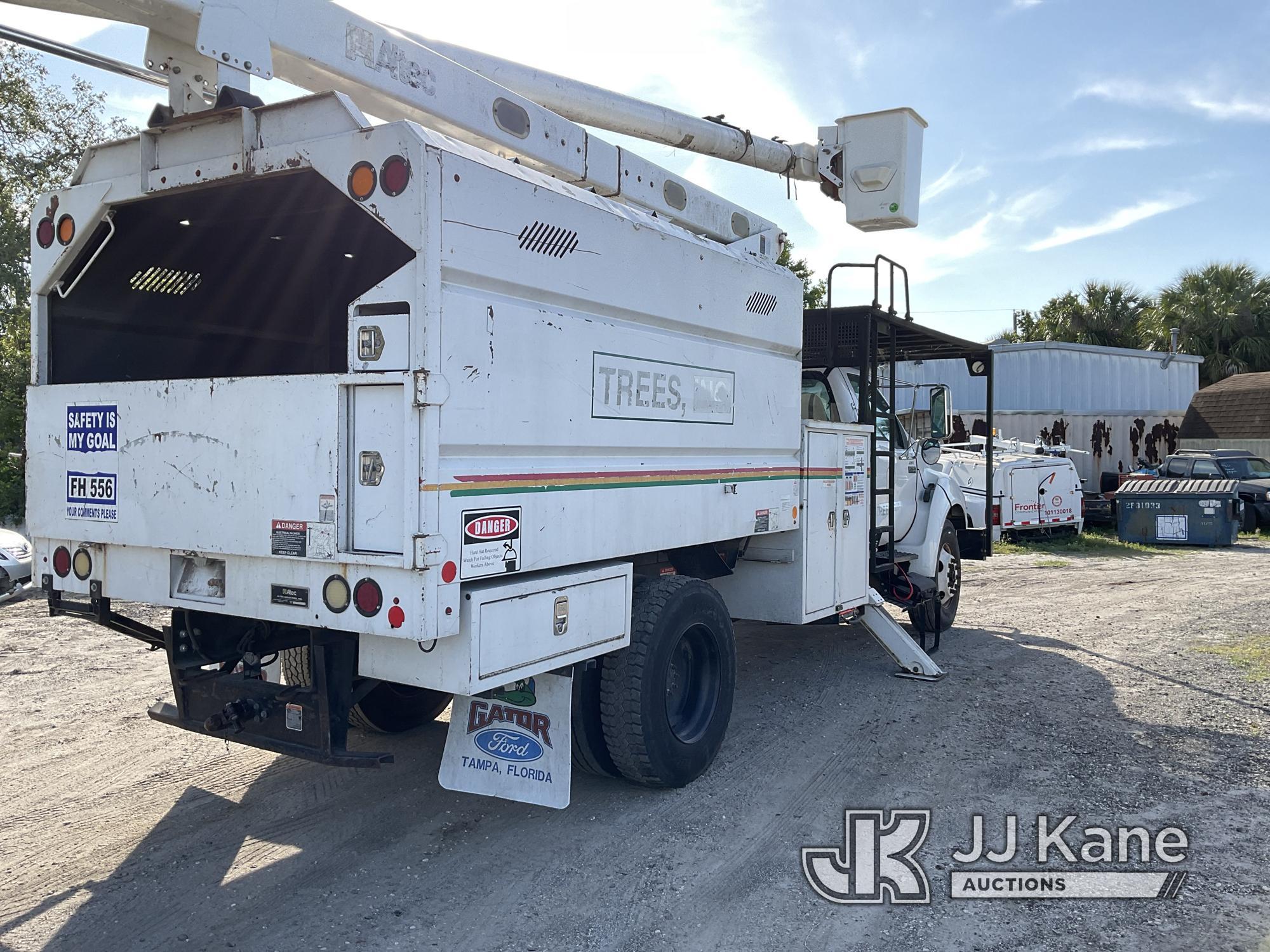 (Tampa, FL) Altec LRV-56, Over-Center Bucket Truck mounted behind cab on 2010 Ford F750 Chipper Dump