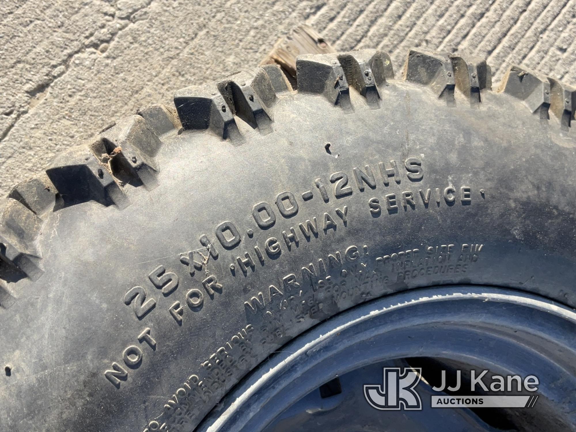 (Dixon, CA) Pallet with Miscellaneous Tires (1- 25X10.00-12NHS Tire With Rim 1-AT25X8R12 Tire With R