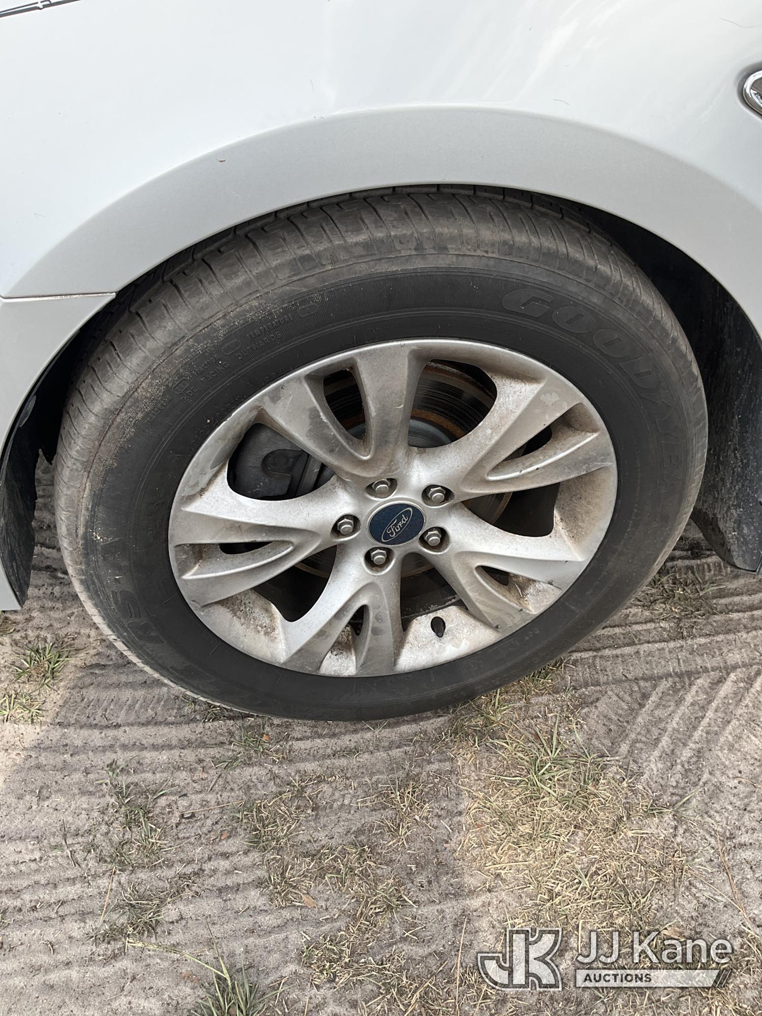 (Ocala, FL) 2012 Ford Taurus 4-Door Sedan Runs & Moves) (Jump To Start, Minor Body Damage, Paint Dam