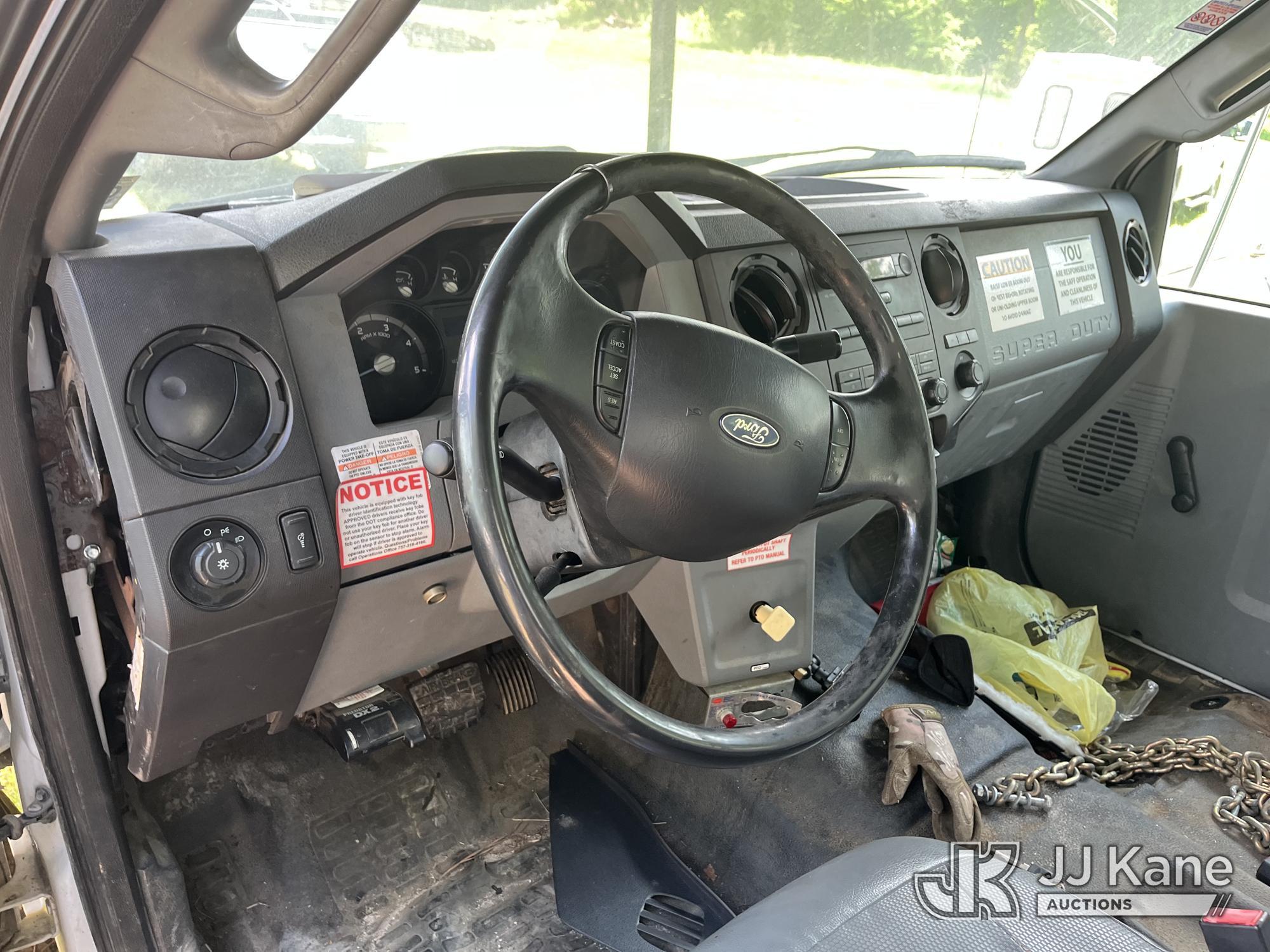 (Wakefield, VA) HiRanger XT55, Over-Center Bucket Truck mounted behind cab on 2013 Ford F750 Chipper
