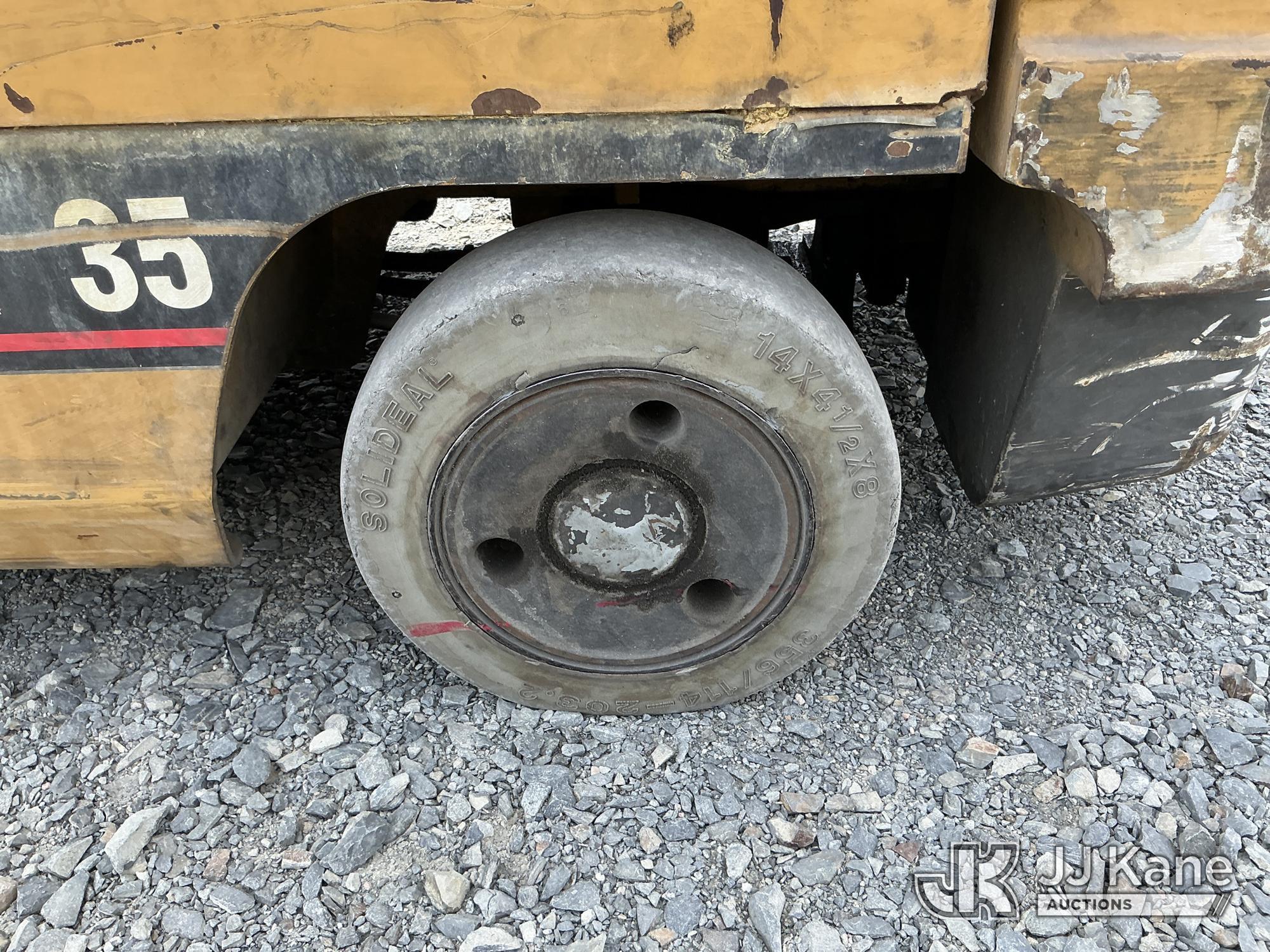 (China Grove, NC) Caterpillar 2EC18, 3,100# Solid Tired Forklift Duke Unit) (Runs, Moves & Operates