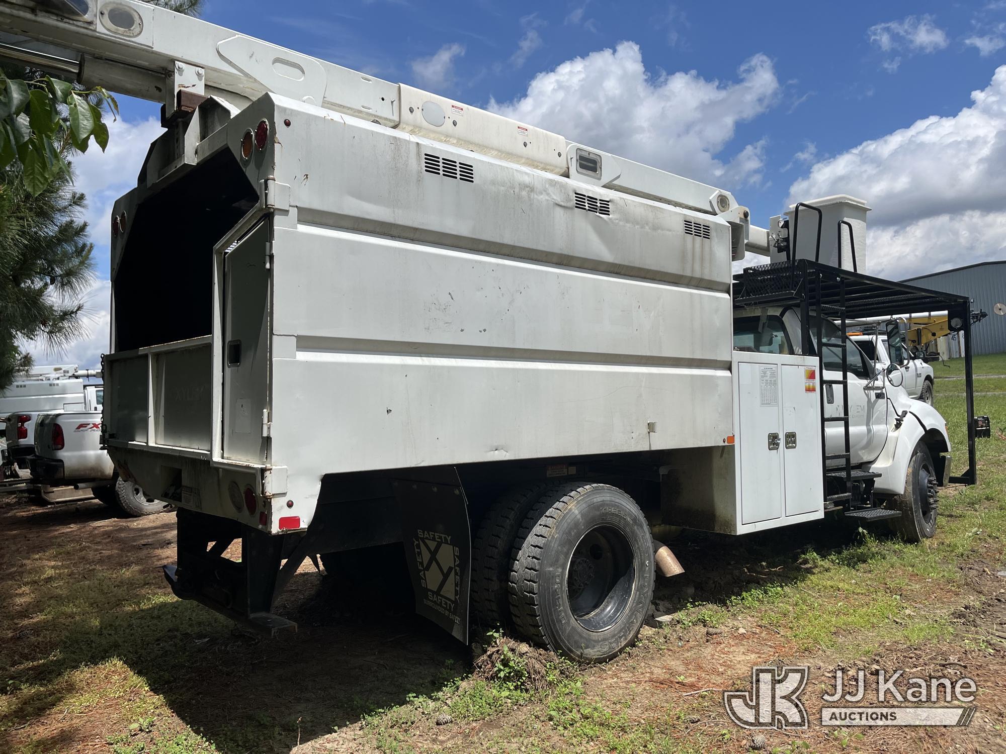(Wakefield, VA) HiRanger XT55, Over-Center Bucket Truck mounted behind cab on 2013 Ford F750 Chipper