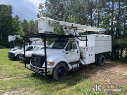 (Wakefield, VA) HiRanger XT55, Over-Center Bucket Truck mounted behind cab on 2013 Ford F750 Chipper