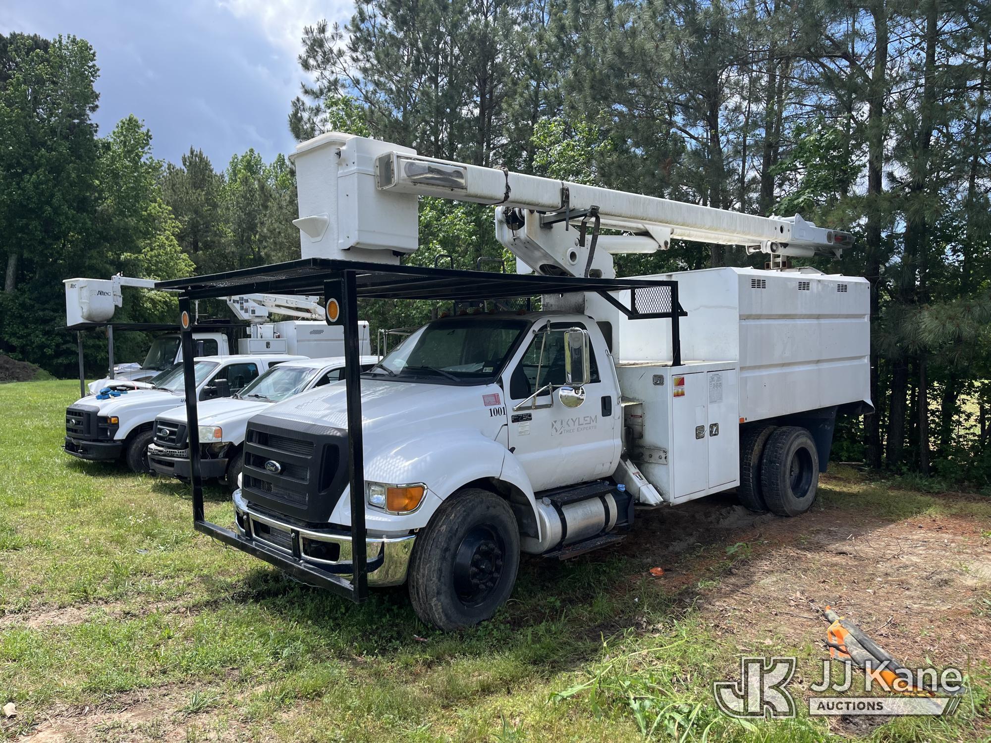 (Wakefield, VA) HiRanger XT55, Over-Center Bucket Truck mounted behind cab on 2013 Ford F750 Chipper