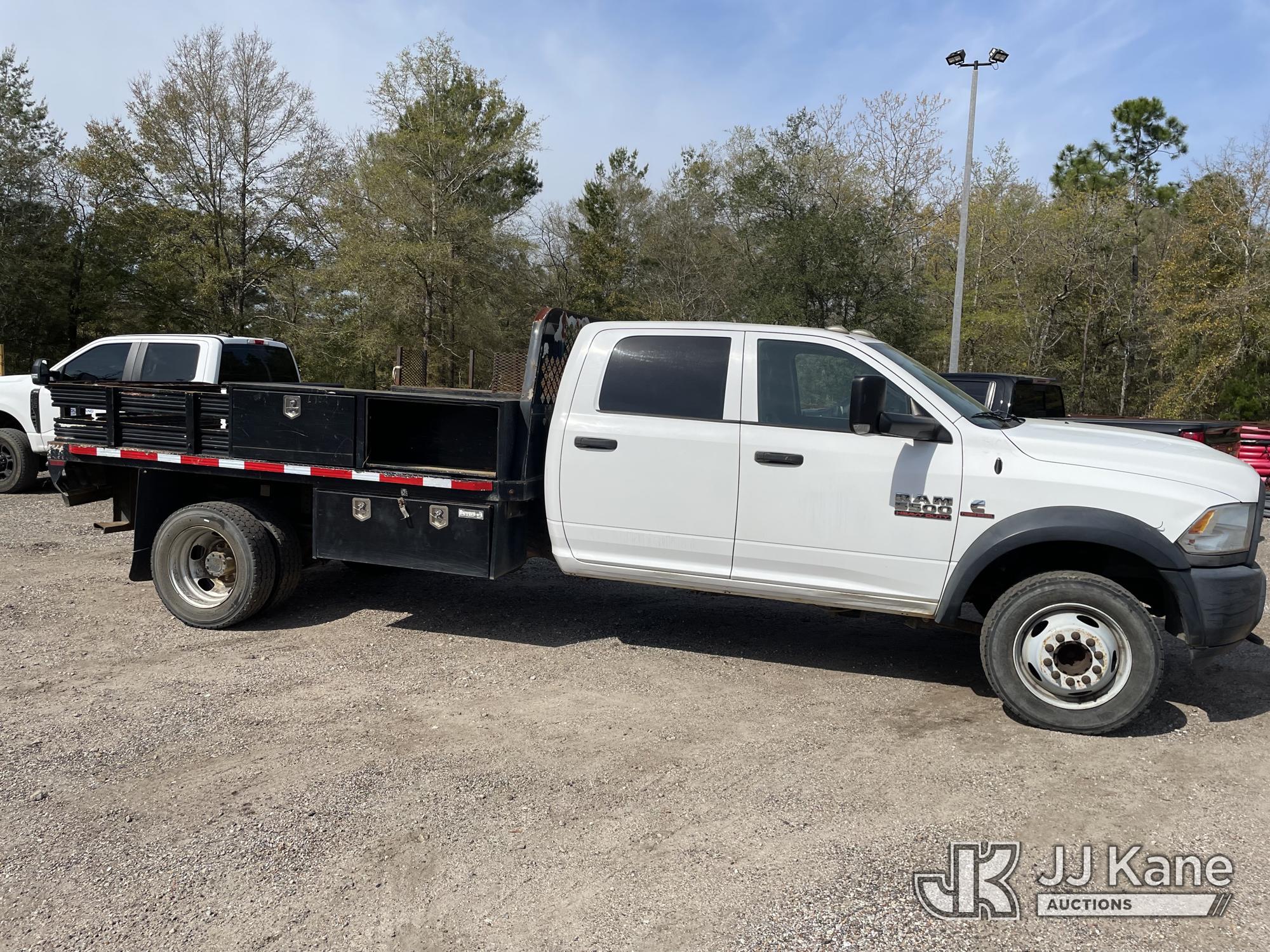 (Defuniak Springs, FL) 2014 RAM 5500 4x4 Crew-Cab Flatbed/Service Truck, (Utility Owned) Runs & Move