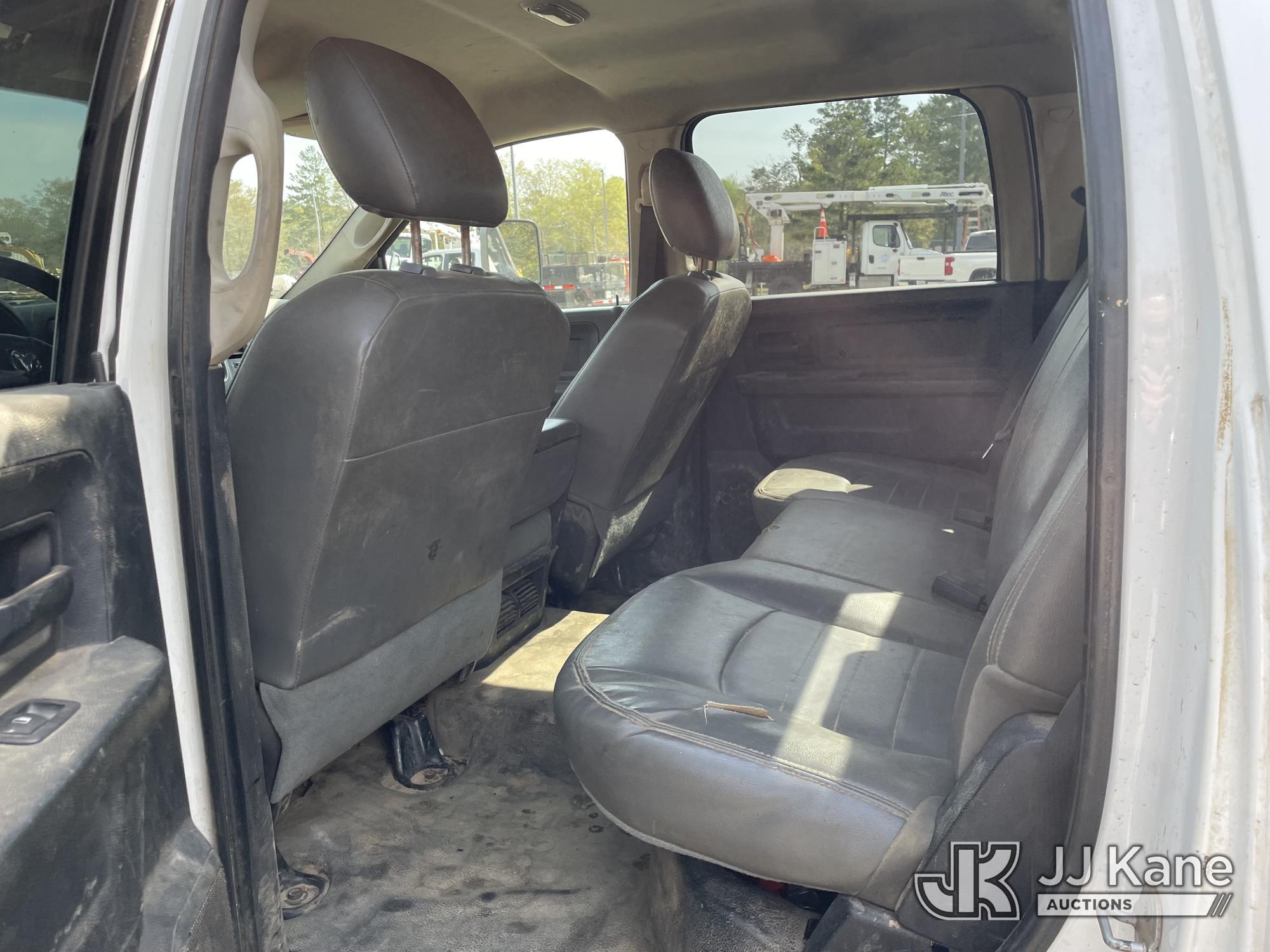 (Defuniak Springs, FL) 2014 RAM 5500 4x4 Crew-Cab Flatbed/Service Truck, (Utility Owned) Runs & Move