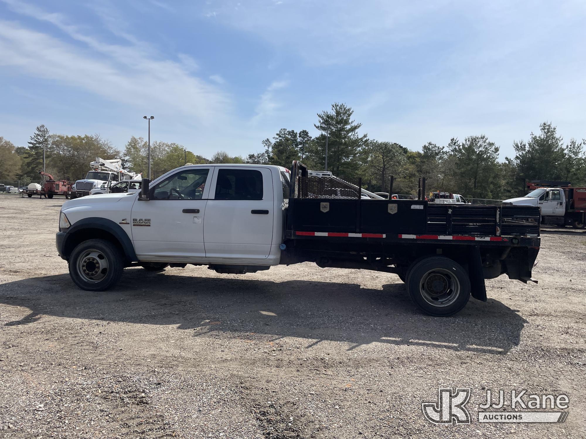 (Defuniak Springs, FL) 2014 RAM 5500 4x4 Crew-Cab Flatbed/Service Truck, (Utility Owned) Runs & Move