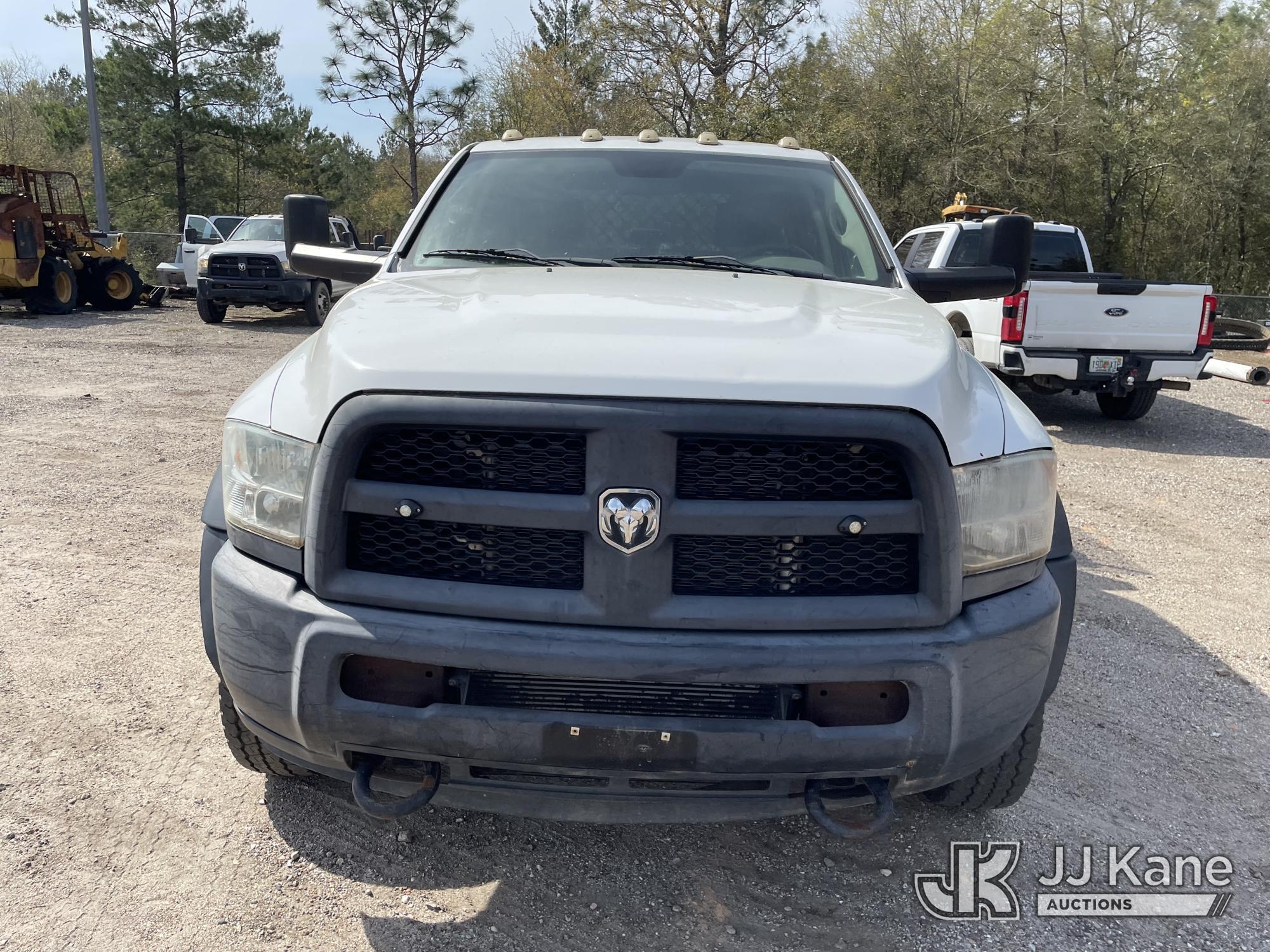 (Defuniak Springs, FL) 2014 RAM 5500 4x4 Crew-Cab Flatbed/Service Truck, (Utility Owned) Runs & Move