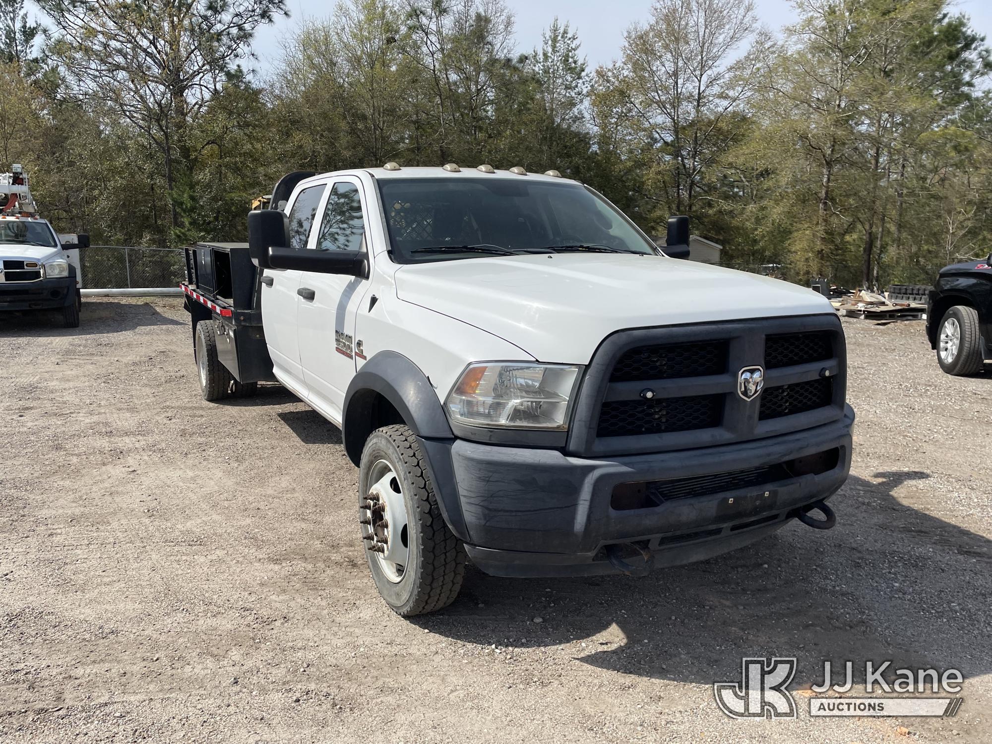(Defuniak Springs, FL) 2014 RAM 5500 4x4 Crew-Cab Flatbed/Service Truck, (Utility Owned) Runs & Move