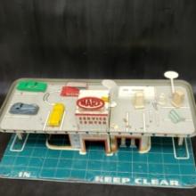1050's Tin Litho Marx Nite Service Station with Skyview Parking