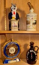 Four Decorative Whiskey Decanters, Including Ezra Brooks and Hammâ€™s Bear