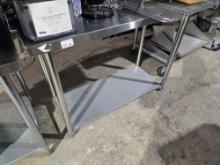 Stainless Steel Table 48"W x 24"D x 36"H w/ 4" Backspalsh