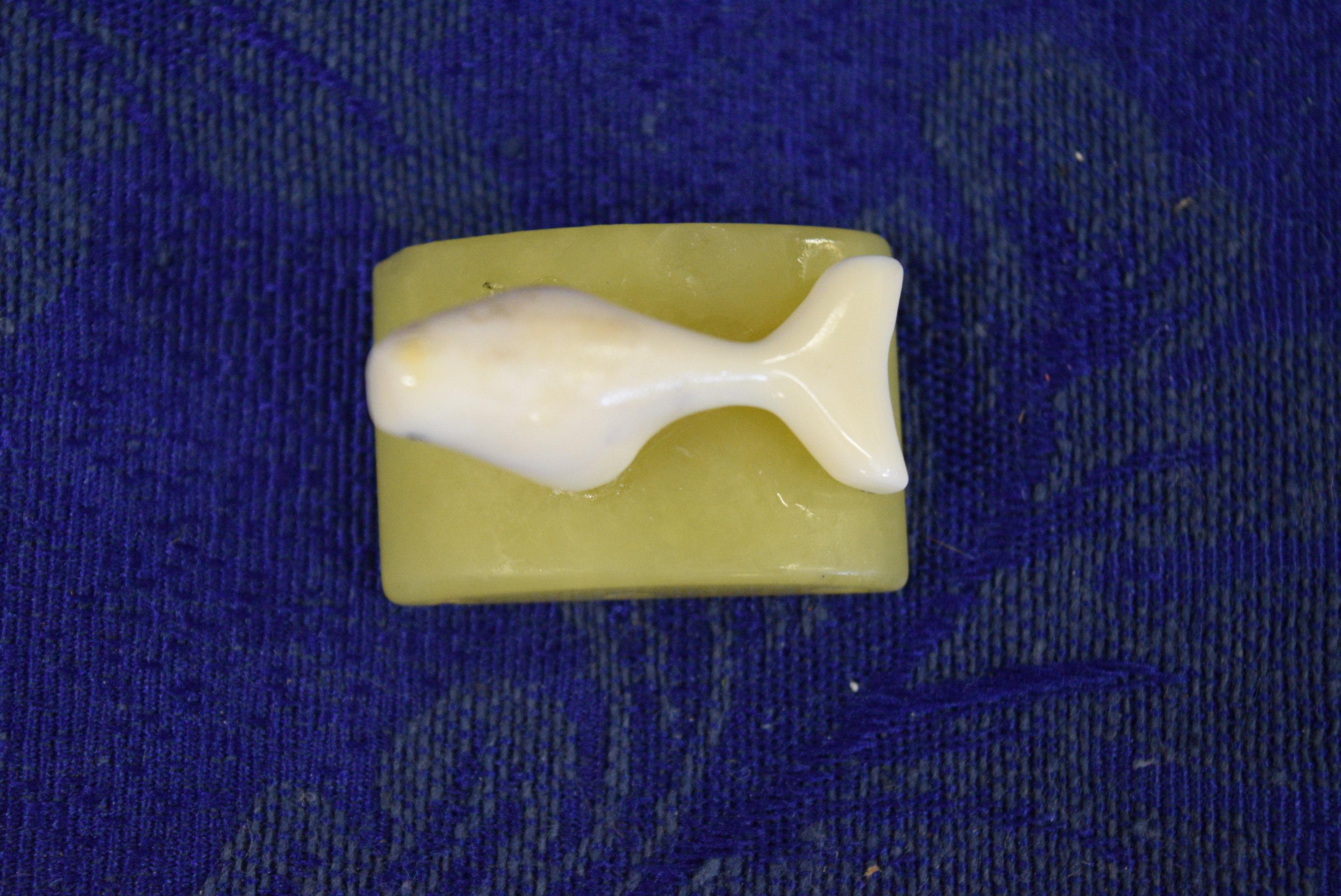 HAND CARVED BONE WHALE ON JADE!