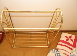 Quilt rack and vintage quilts; quilts show signs of use