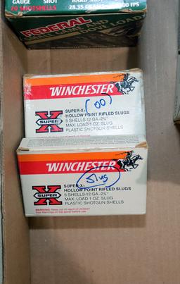 (1) box of slugs, (3)full and (2) partial boxes of 12 ga.
