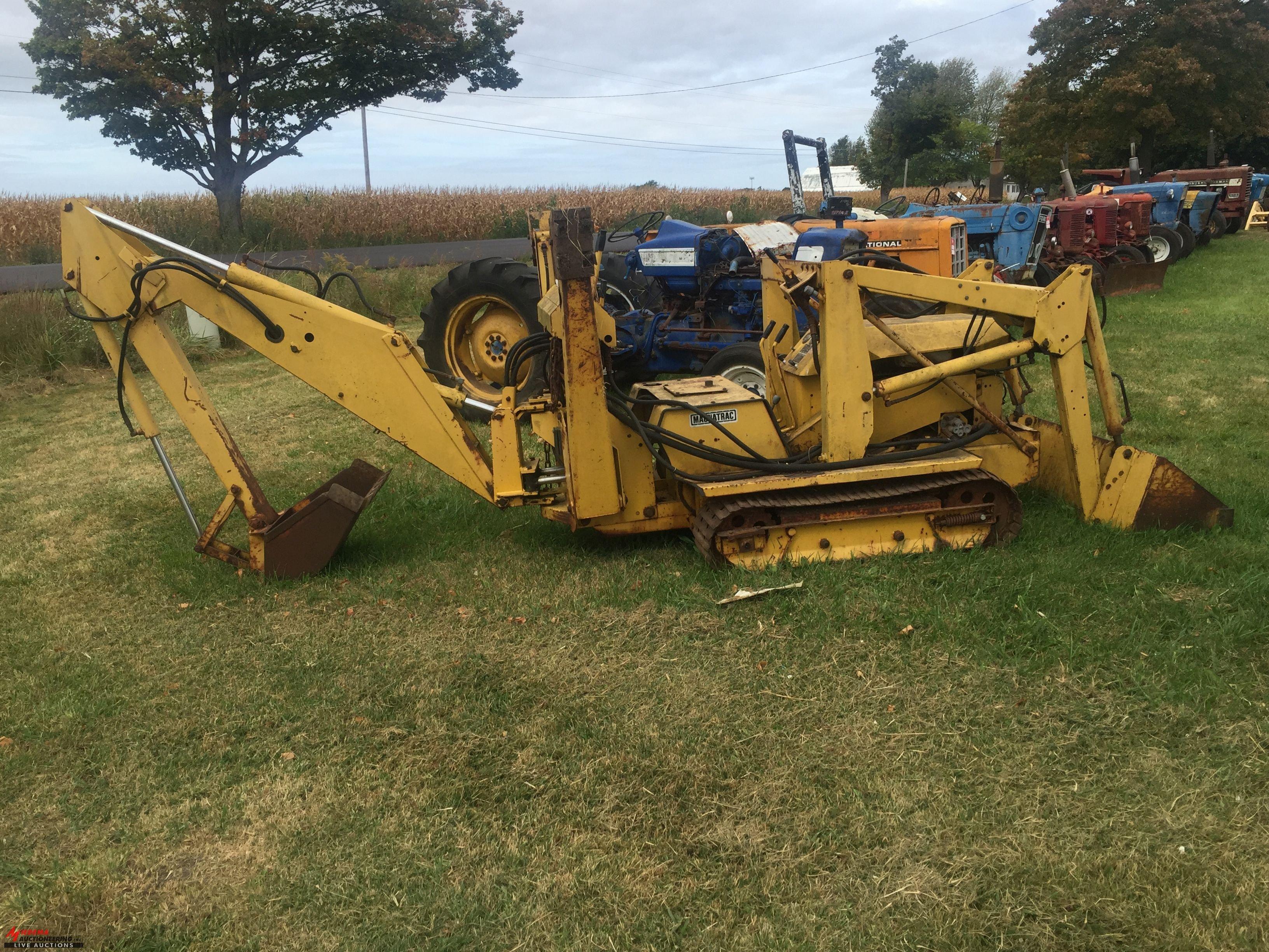 MAGNATRAC CRAWLER LOADER BACKHOE, STEEL TRACKS, RUNS &  MOVES, 1 TRACK DOES NOT MOVE, NO POWER TO IT