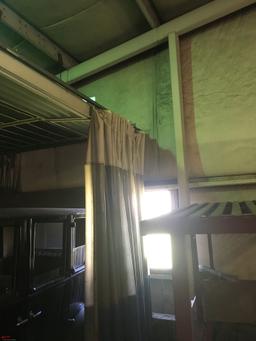 PAINT BOOTH, HAS OVERHEAD LIGHTS, OVERHEAD CURTAIN ENCLOSURE, LARGE FUME TYPE EXTRACTOR, ALSO COMES 