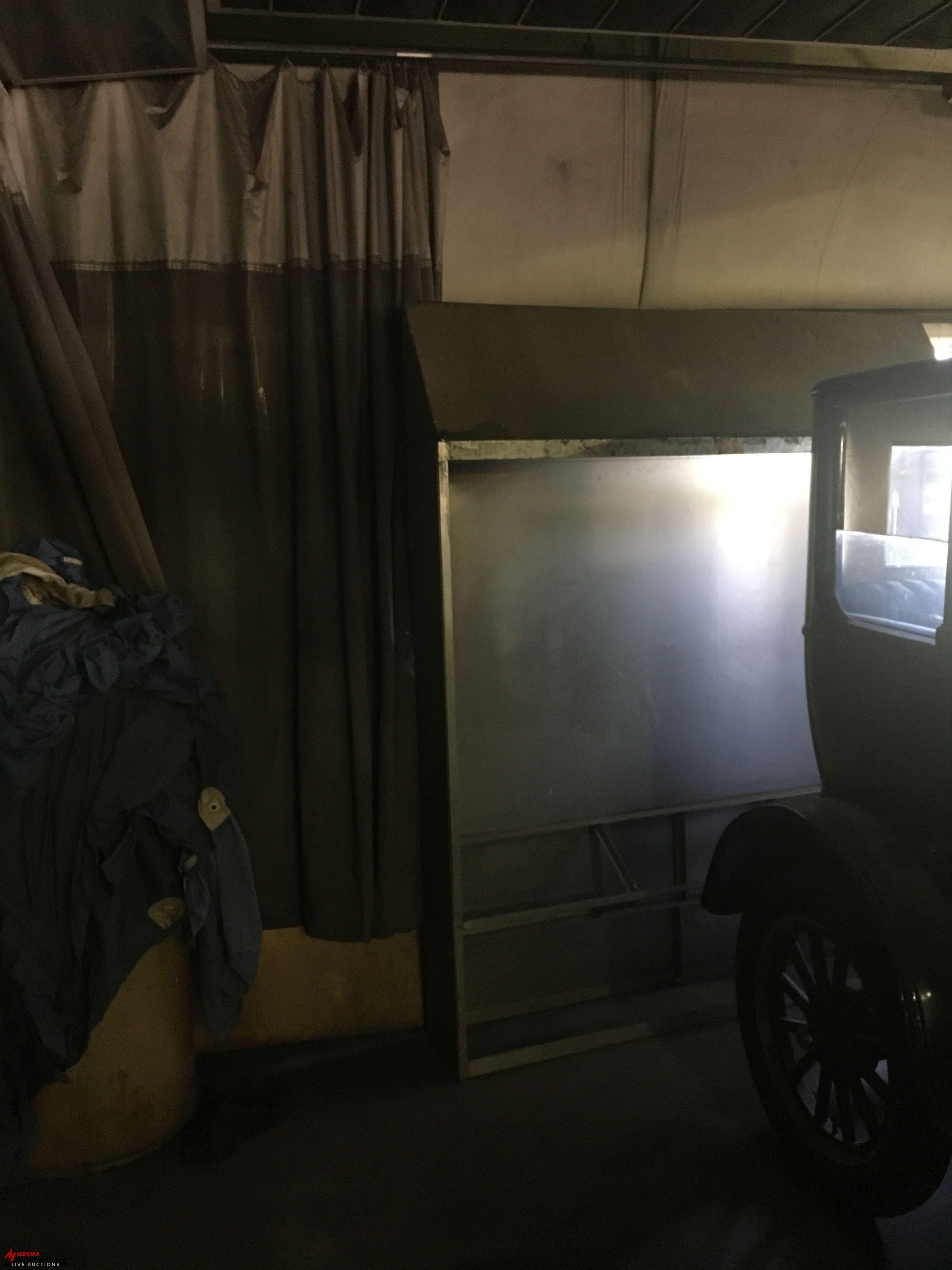 PAINT BOOTH, HAS OVERHEAD LIGHTS, OVERHEAD CURTAIN ENCLOSURE, LARGE FUME TYPE EXTRACTOR, ALSO COMES 