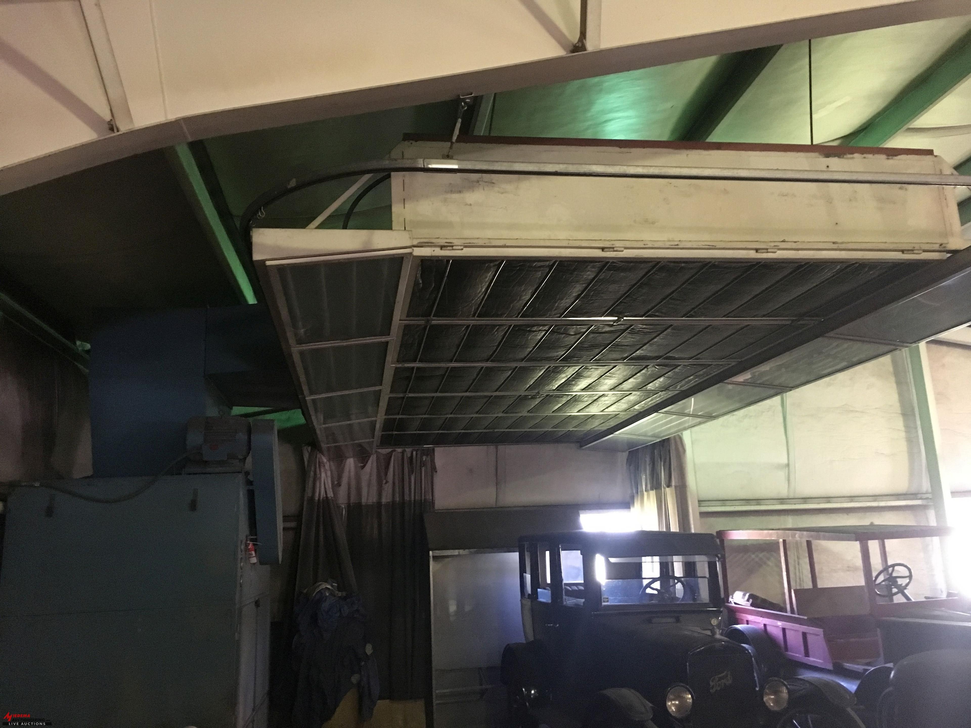 PAINT BOOTH, HAS OVERHEAD LIGHTS, OVERHEAD CURTAIN ENCLOSURE, LARGE FUME TYPE EXTRACTOR, ALSO COMES 