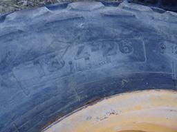18.4-26 RIMS AND TIRES (4)