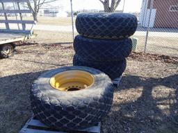 18.4-26 RIMS AND TIRES (4)