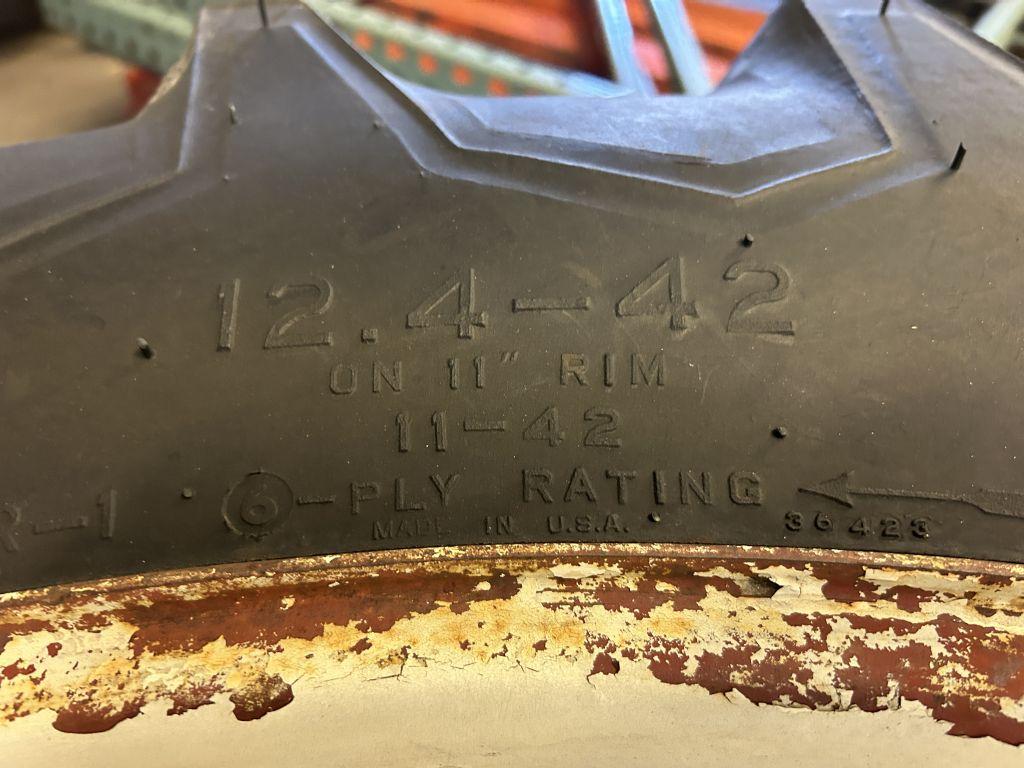 FIRESTONE 12.4-42 TIRES ON 8-BOLT RIMS (2 QTY.)