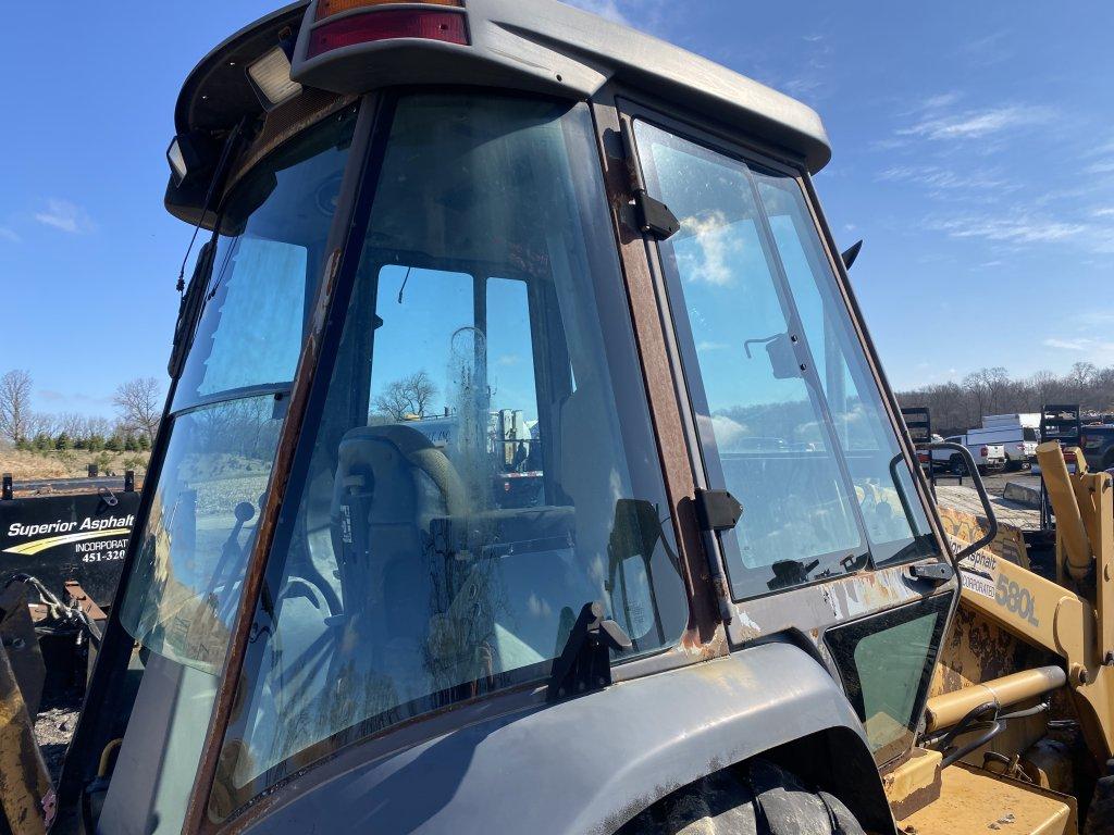CASE 580L LOADER BACKHOE, 4X4, CAB, 82'' FRONT BUCKET, 23'' REAR BUCKET, REAR OUTRIGGERS, MISSING LO