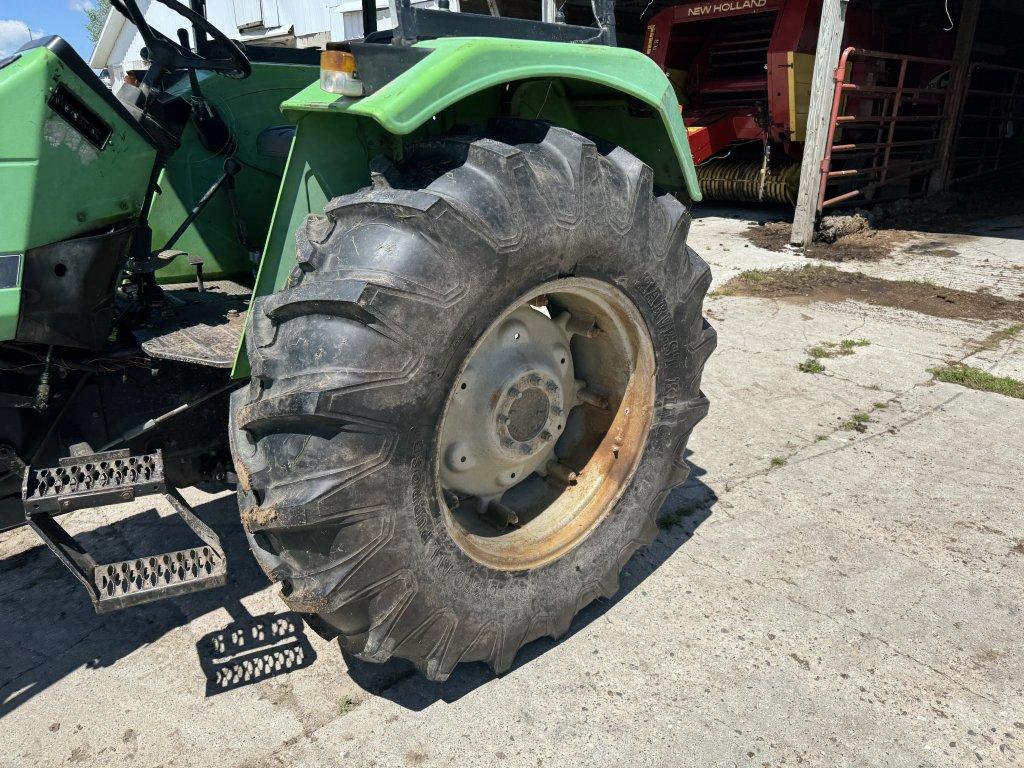 DEUTZ 6275 TRACTOR, 4WD, CANOPY, 3PT, NO TOP LINK, 540 PTO, 2-REMOTES, (12) FRONT WEIGHTS, 18.4-30 R