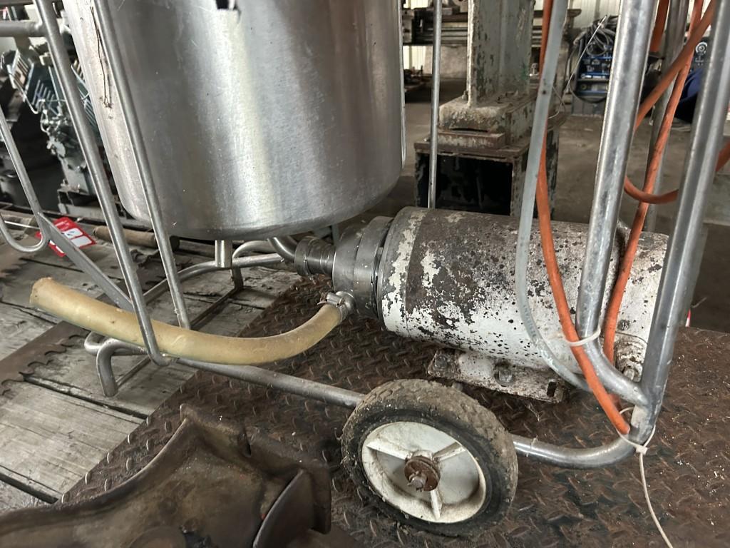 ELECTRIC MILK PUMP WITH STAINLESS CAN ON A CART