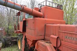 MF 410 diesel combine, includes weights under combine