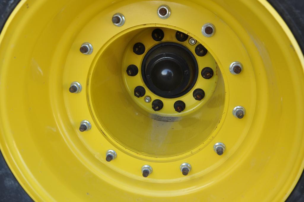 Mainframe axle assembly & tires off JD DB60 planter