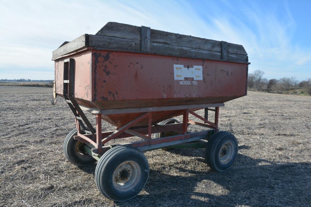 Huskee Model 165 gravity wagon on John Deere 953 running gear