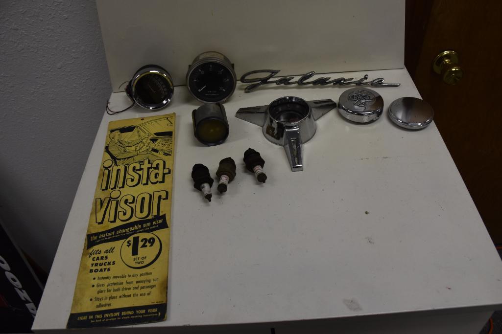 Flat of Automobile Gauges, Emblem Badges, Spark Plugs, Etc.