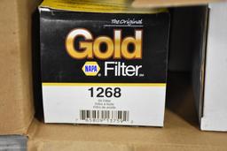 Box of Filters, Lubricants, and Engine Oil Priming Tools