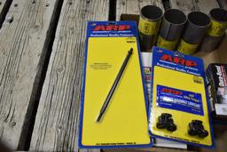 Misc. Auto Parts to Include, timing set: (4) header reducers, ford drive shaft kit, etc.
