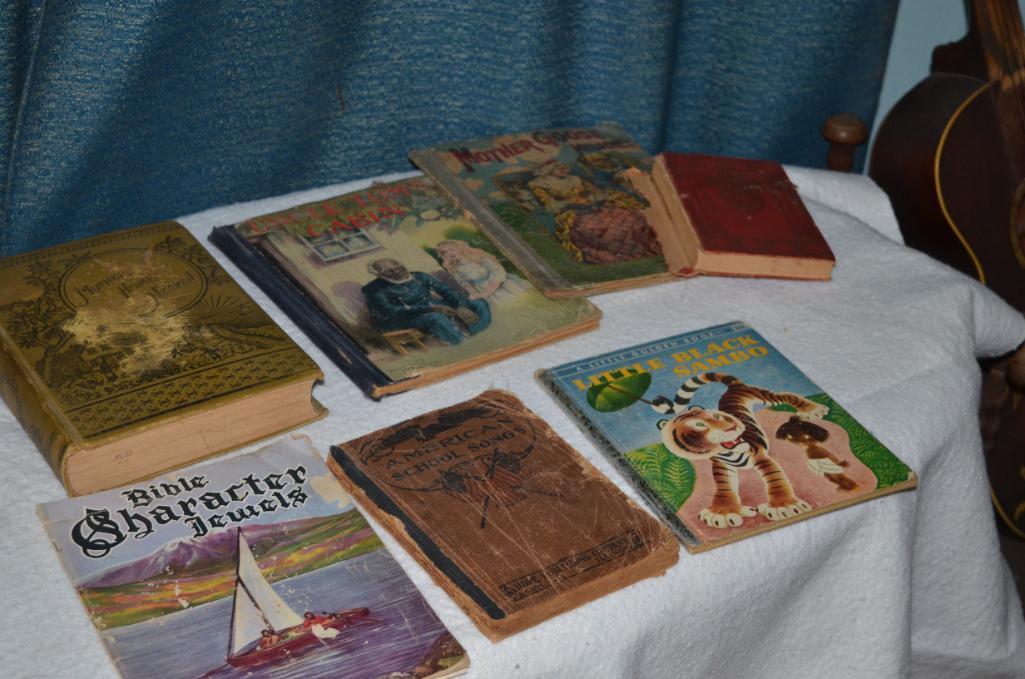 Antique books to include Mother Goose & Uncle Tom