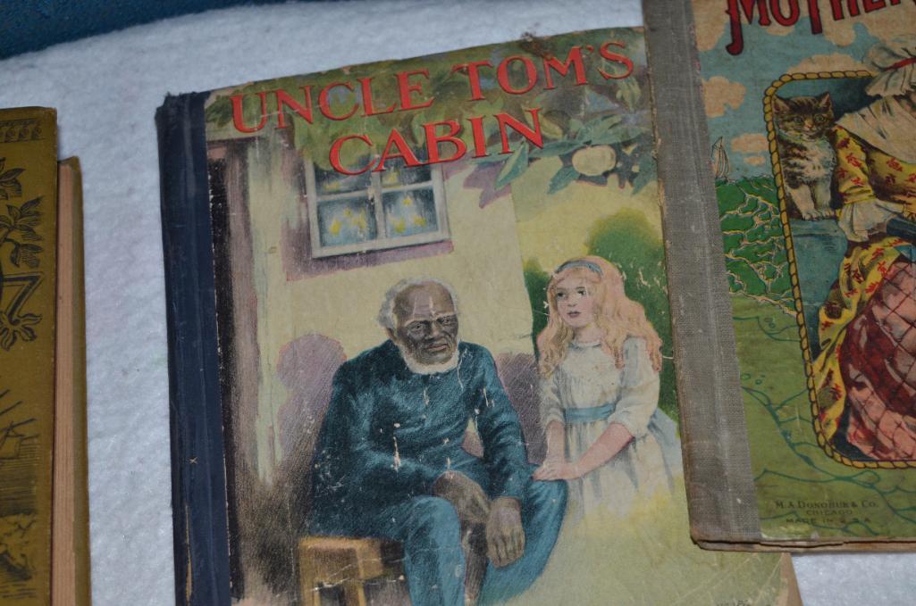 Antique books to include Mother Goose & Uncle Tom