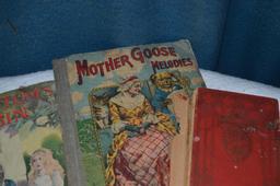 Antique books to include Mother Goose & Uncle Tom