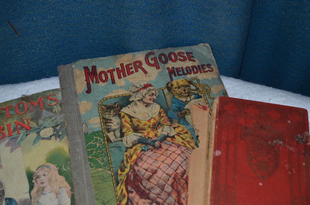 Antique books to include Mother Goose & Uncle Tom