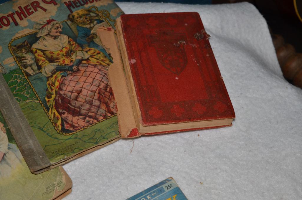 Antique books to include Mother Goose & Uncle Tom
