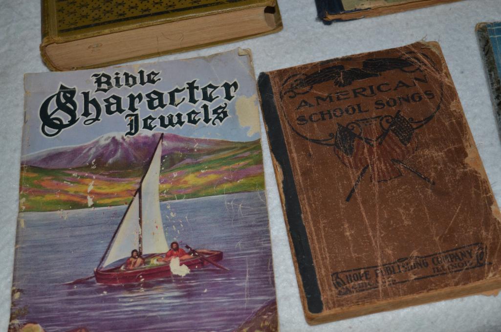 Antique books to include Mother Goose & Uncle Tom