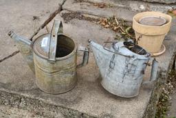 (2) Galv. Sprinkler cans being used as planters